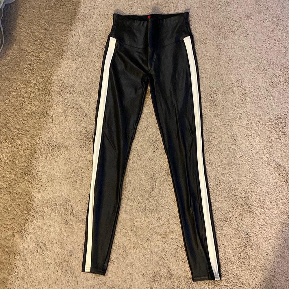 Spanx faux leather leggings with white stipe on sides   Size small. Like new
